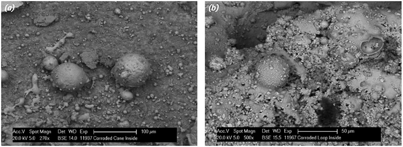 Fig 7: SEM picture of spherical nodules. 7a Balls resulting from arcing which create a point contact. 7b Melted metal forming spherical balls, some of them re-melted into the surface.