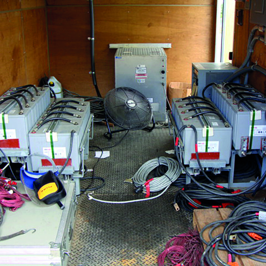 This is an example of two temporary batteries used in the field during testing operations. Each is 120 volts but can be configured as a single 240 volt system when needed. Certain site circumstances require such a battery be connected to the dc system while the battery being tested is out of service to cover the need for backup power. The VRLA battery set in a utility trailer, along with the needed charger, switchgear and cabling is pretty common in the electric utility industry.