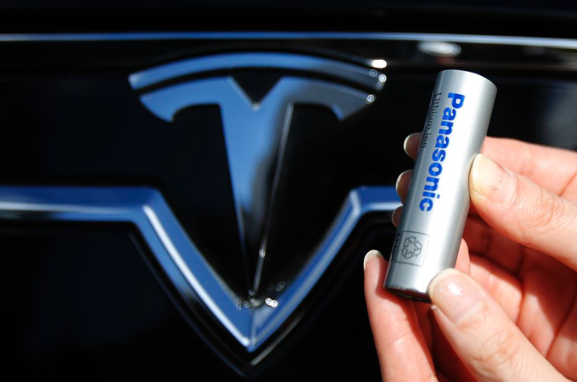 Panasonic cell in front of Tesla logo