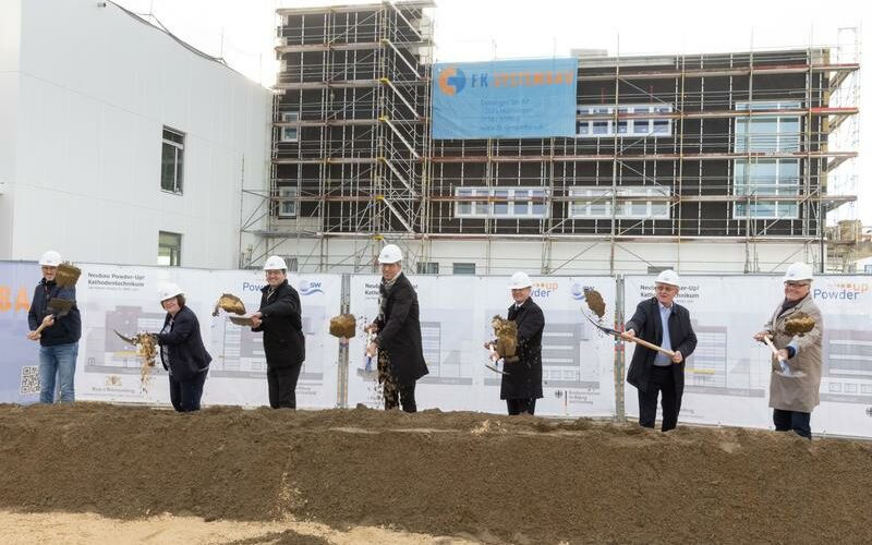 people breaking ground