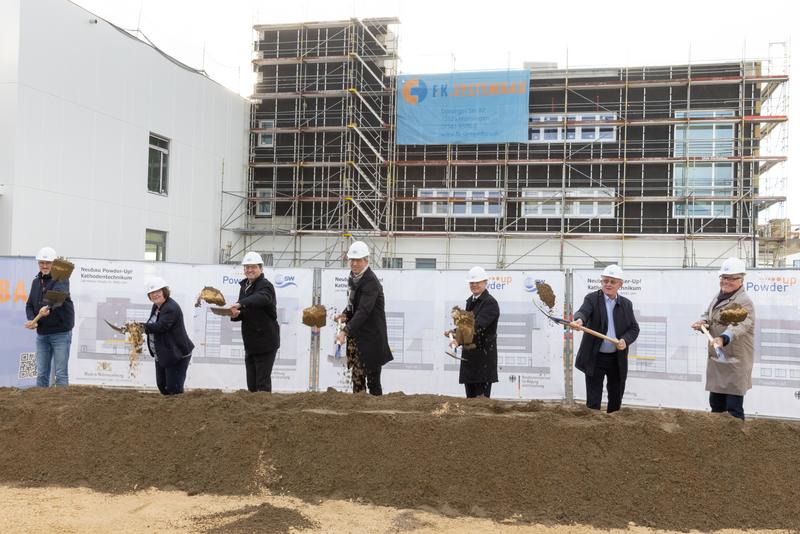 people breaking ground