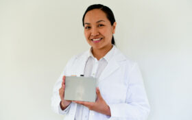 woman holding battery