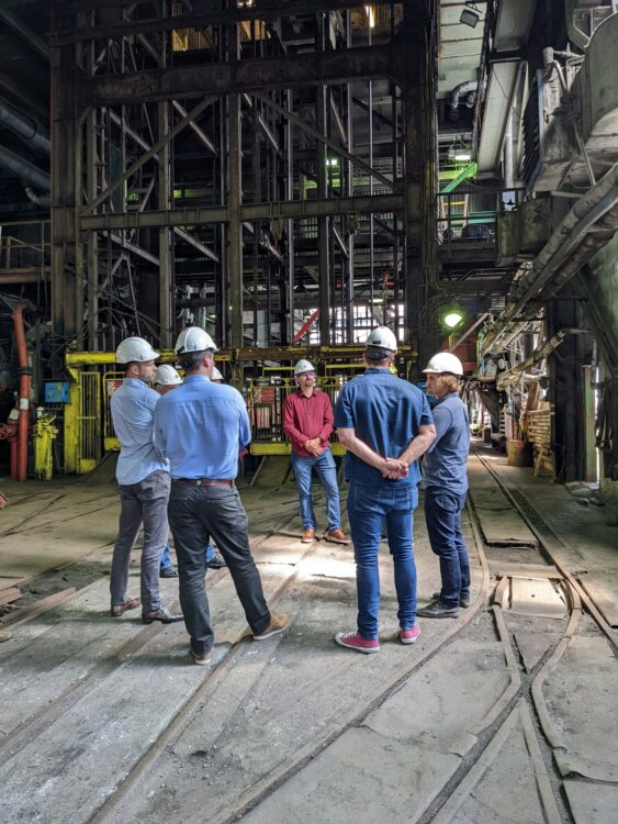 Men standing around