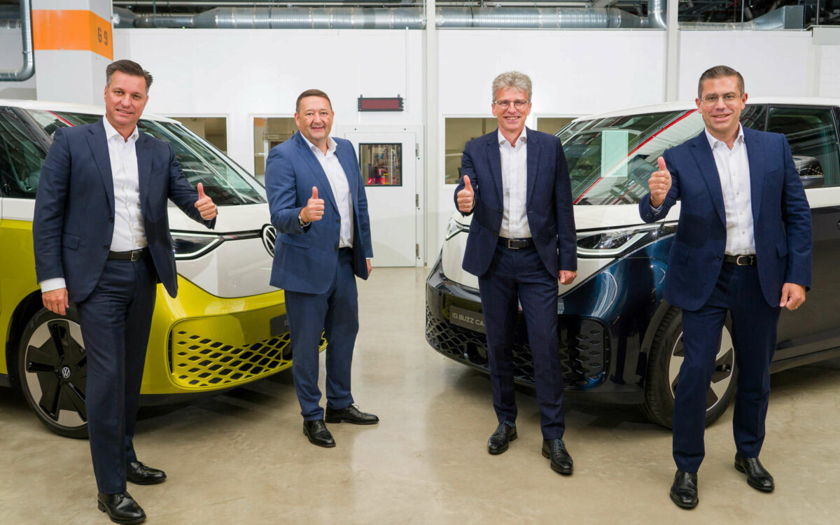 4 men giving a thumbs up