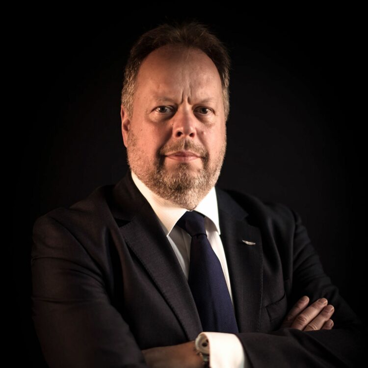 man with arms folded