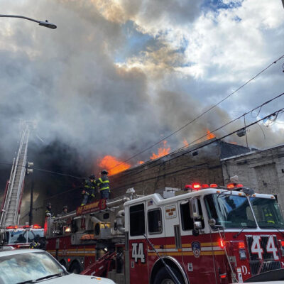 FDNY fighting an e-bike fire that caused extensive damage to adjacent buildings