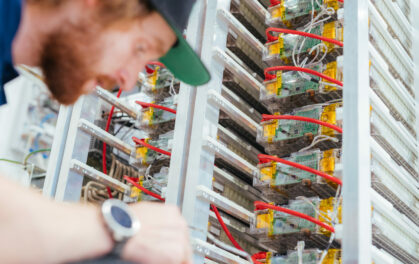 man working on a battery