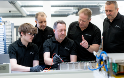 four male battery testers at a battery