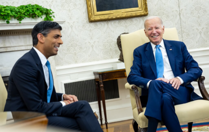 biden and sunak sitting and laughing