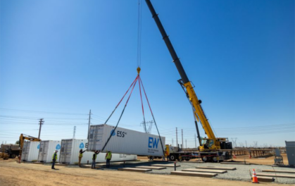 crane lowering energy storage into place