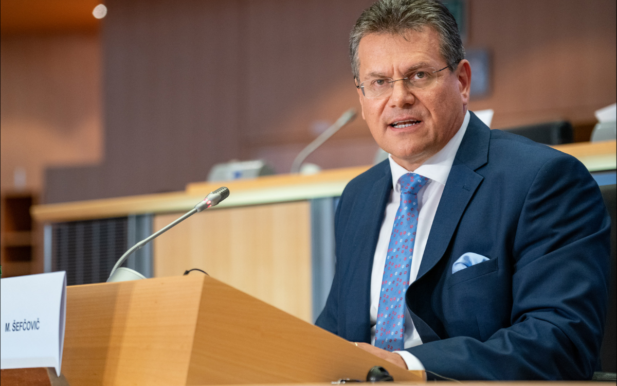 man at lectern