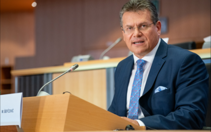 man at lectern