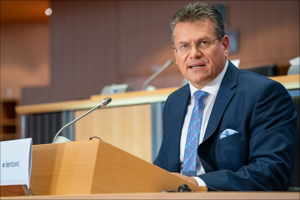 man at lectern