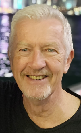 man smiling, head and shoulders