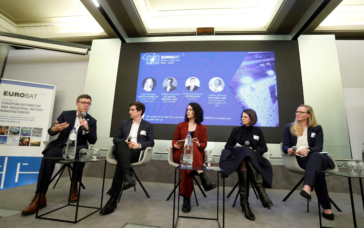 group of people sitting for a panel discussion