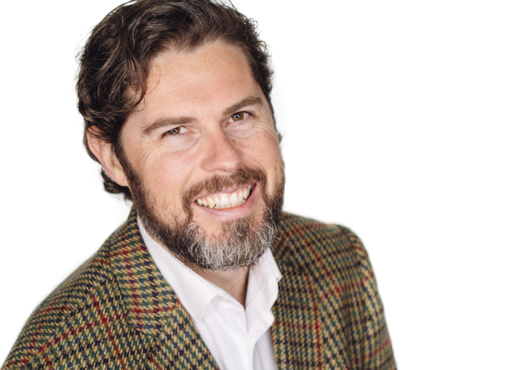 head and shoulders of bearded man in jacket