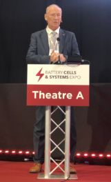 man at lectern