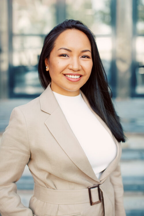 smiling woman with long dark hair