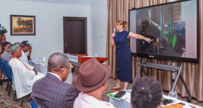 Franziska Weber (Head, Platform Lead) explains to participants the benefits of using a hammer mill battery breaker.
