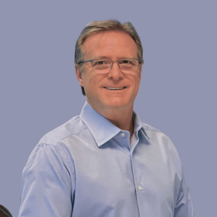 head and shoulders of man smiling