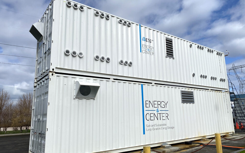 2 white shipping containers stacked