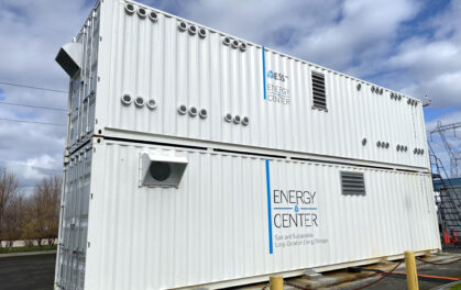 2 white shipping containers stacked