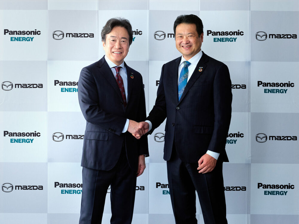 twm men in suits shaking hands